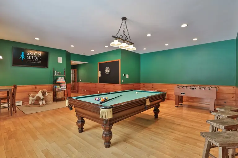 Pool and foosball in the game room.
