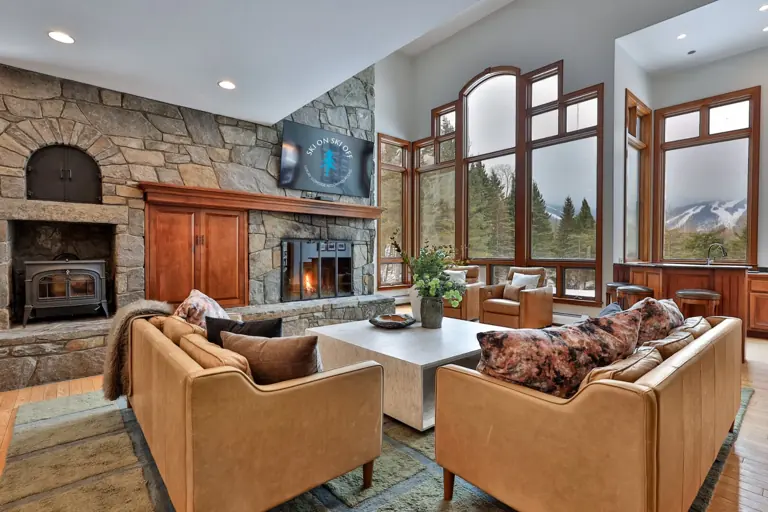 The great room and its stone fireplace